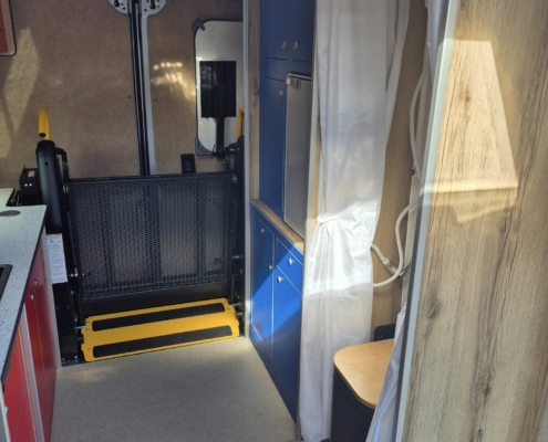 A camper has access for a wheelchair