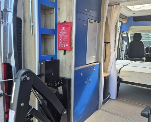 A camper has access for a wheelchair